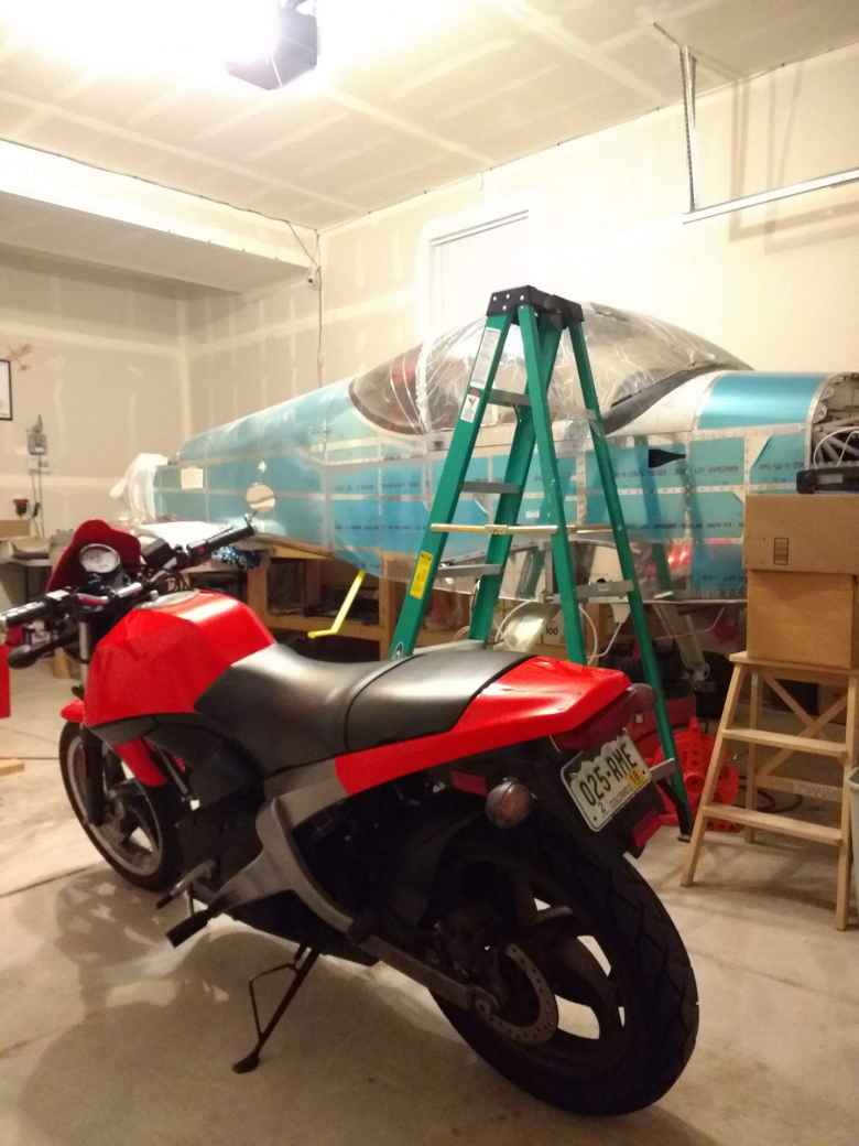 I once had to stop by my friend's place to make an emergency repair in south Fort Collins. My Buell looked pretty good next to the wingless plane.