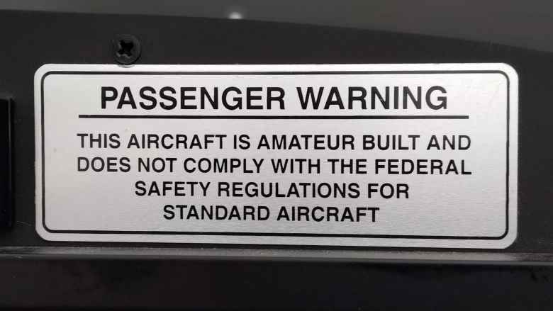 "Passenger warning: This aircraft is amateur built and does not comply with the federal safety regulations for standard aircraft."