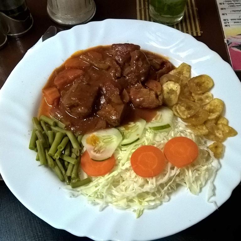 Fricasé de cerdo (stewed pork) with green beans, cabbage, carrots and plantains at Don Saluatore restaurant in Havana Vieja.