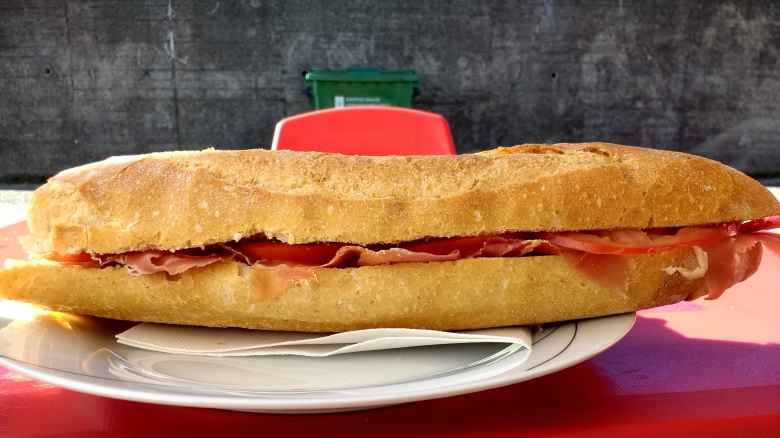 A bocadillo de jamón y tomate along the Camino de Fisterra.