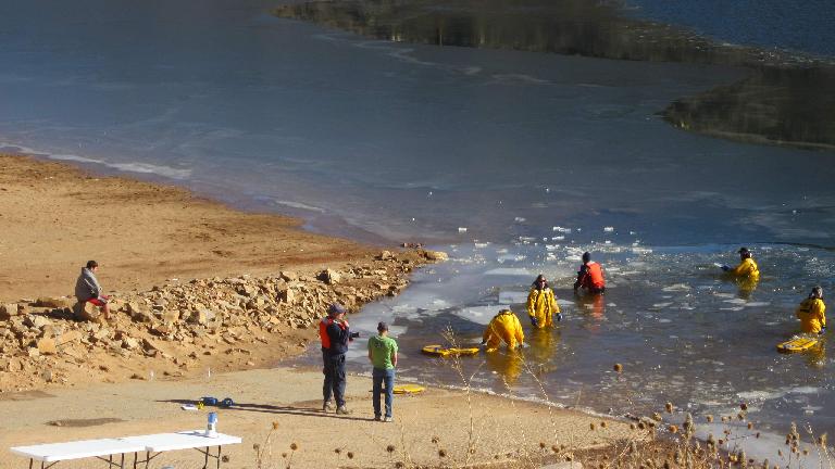 Prepping the area for the Polar Plunge. Note all the ice!