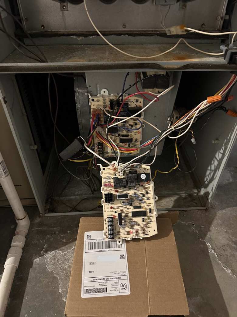 Replacing the circuit board on the 22-year-old Carrier furnace.