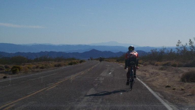 [Mile 444, 4:22 p.m.] Riding down a 16-mile descent to Amboy.  It was supposed to be somewhat treacherous with soft shoulders so Raquel & Tori followed closely behind in the crew vehicle.