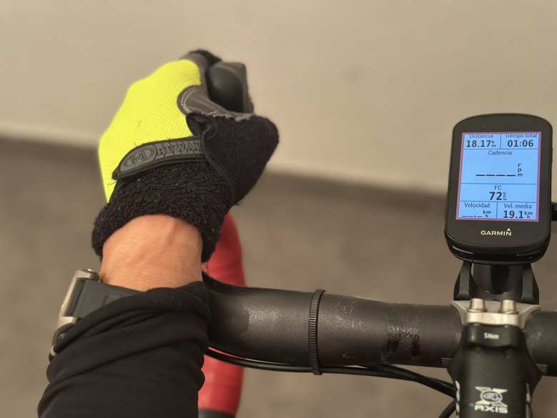 The underside of my wrists are often resting on the handlebars while biking. Therefore, wearing the watch on top of the arm two finger widths away from the wrist bone was the preferable way to wear the Garmin.