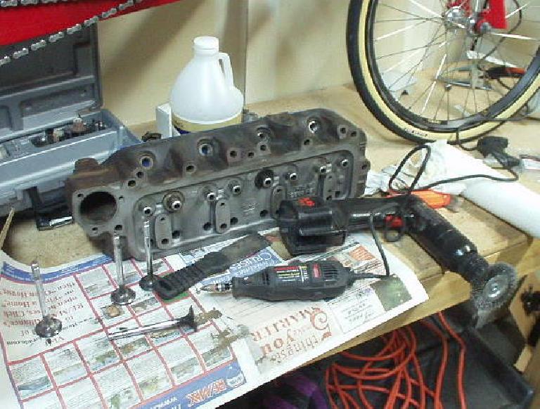 A wire wheel and Dremel tool came in handy in cleaning up the valves on a new (old) cylinder head taken from a 1970 MGB.