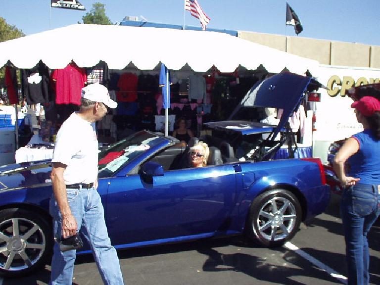 There were modern vehicles too, including this Cadillac XLR in which this lady was giving a demo of its power roof.