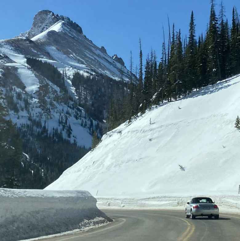 My silver 2001 Audi TT Roadster Quattro surrounded by snow walls near the top of Cameron Pass in the Poudre Canyon.