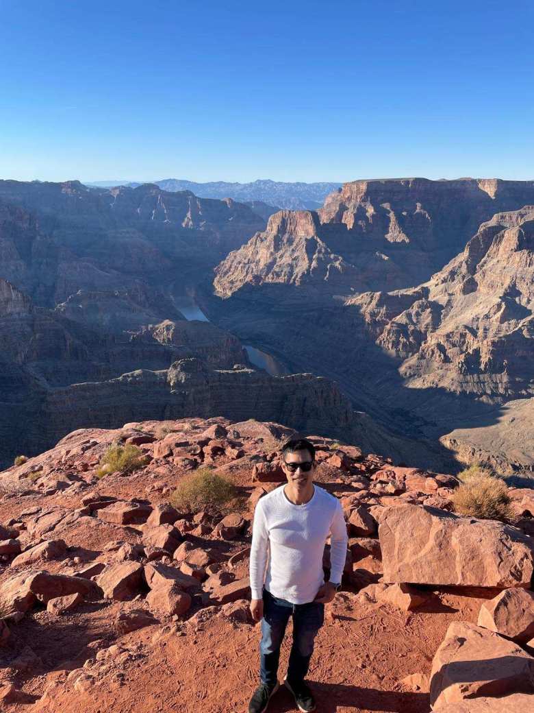 Felix at Grand Canyon West, with the Colorado River in the background.