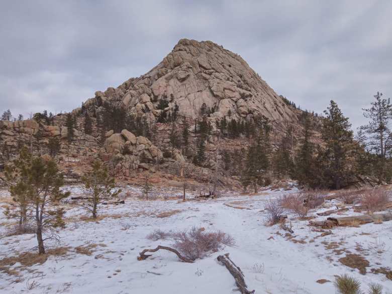 snow and trees in front of the southern face of Greyrock