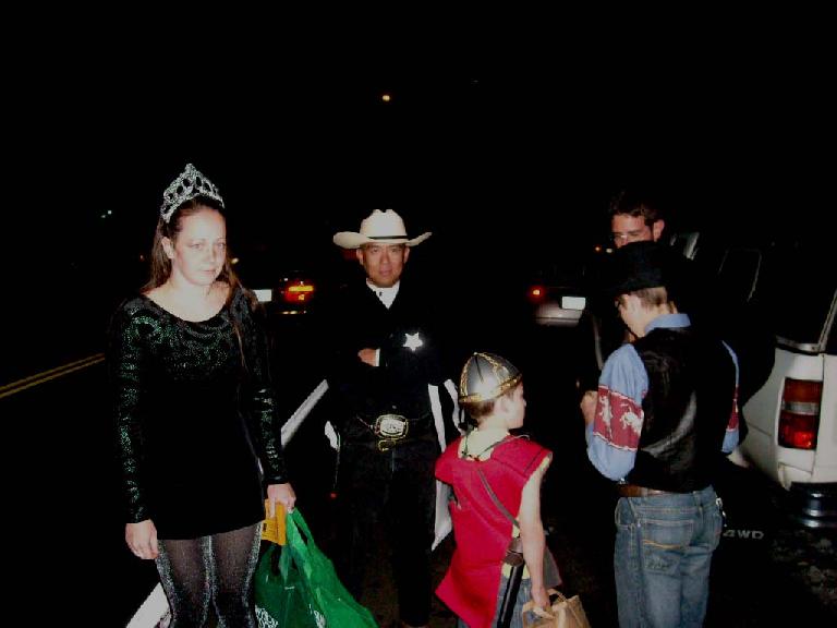 It was already dark when we met up to go trick-or-treating for books.  Here's Ryan, John, Davy, Cody, and Jon.