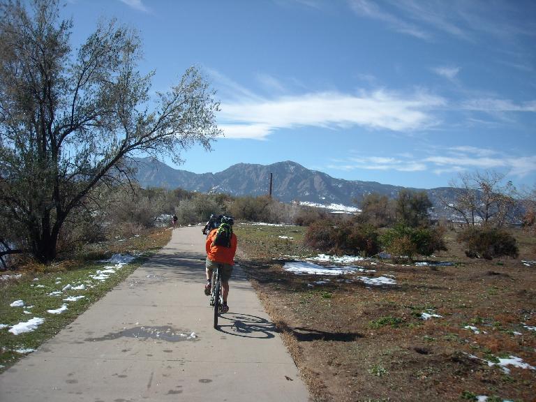 Riding along the recreation trail towards the Flatirons.