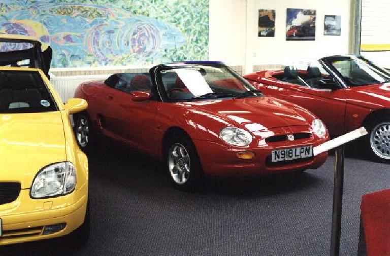 A red 2000 MG F inside the Haynes Motor Museum in England.