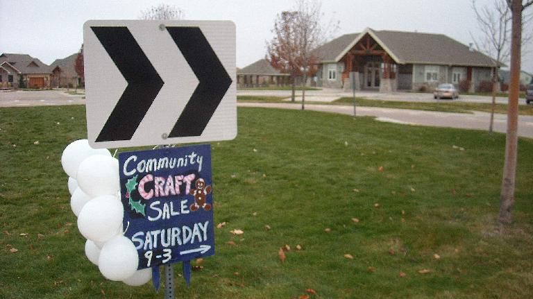 The sign and balloons that Dee put up.