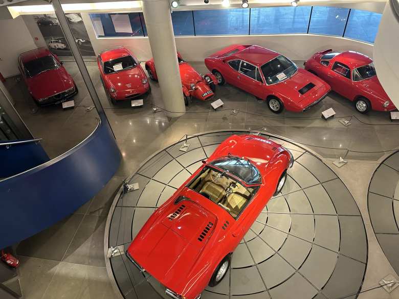 Red cars in the Hellenic Motor Museum.
