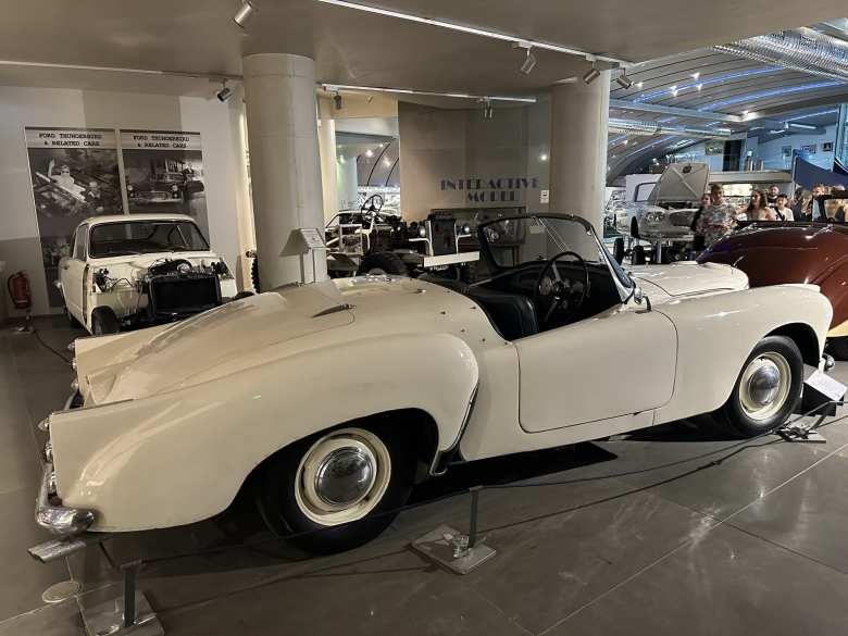 This white 1955 Daimler Conquest Roadster was made by Daimler the British motor vehicle manufacturer, not to be confused with the German one.