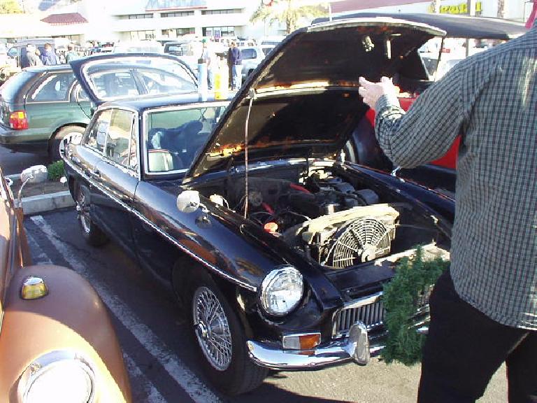 The car tour which consisted of at least 100 cars was supposed to be for pre-1931 horseless carriages only.  However, some exceptions were made for a Volkswagen Bus, NSU Prinz 30, and this MGB GT.