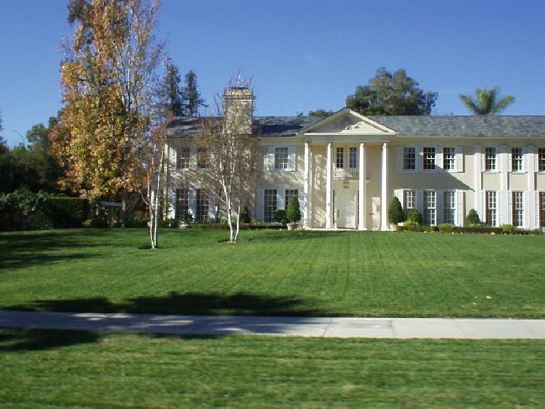 The tour required a 3 pages of driving directions to navigate through all the turns in Pasadena's gorgeous neighborhoods.  This colossal home was typical of some of the houses there.