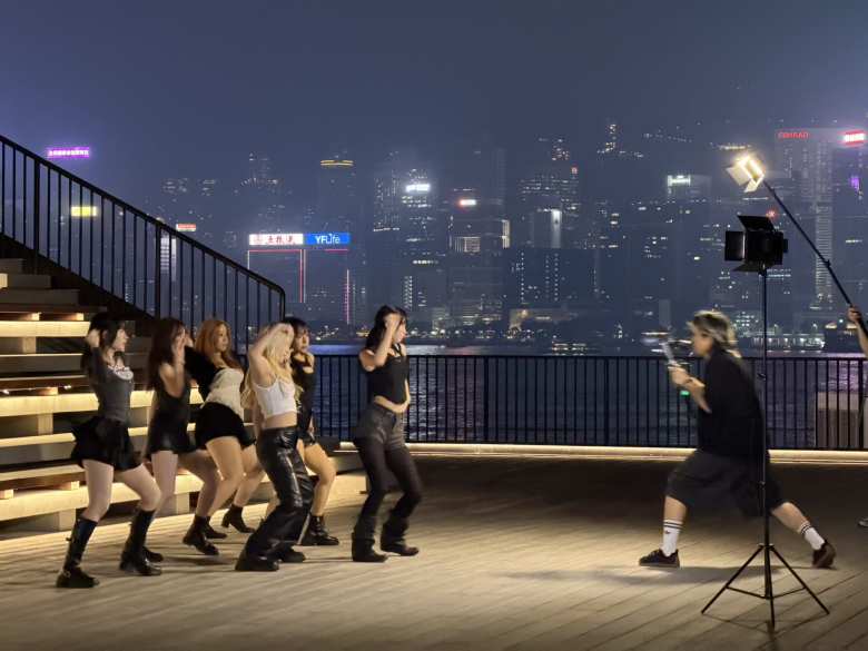 A group of young people  choreographing a dancefor a video at the M+ on a Sunday night in Hong Kong.