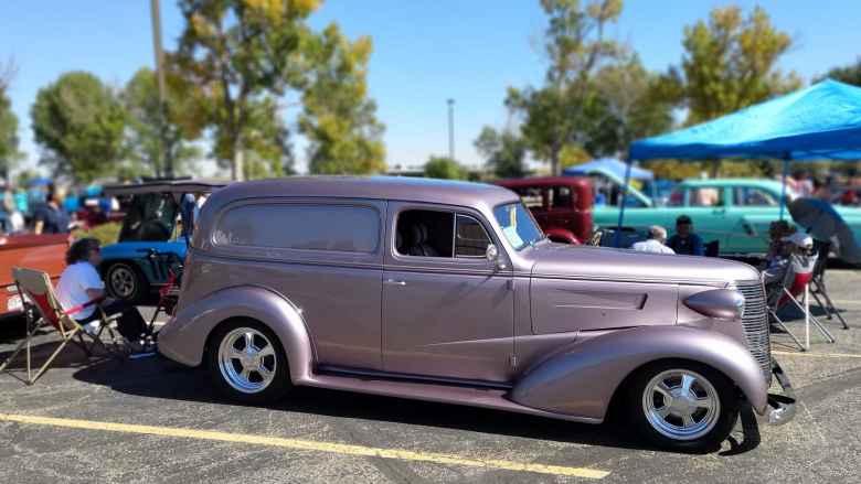 A violet hot rod panel van.