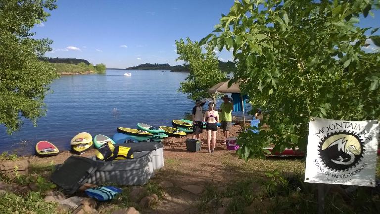 Paddleboards and yogis at Horsetooth Reservoir's Satanka Cove.