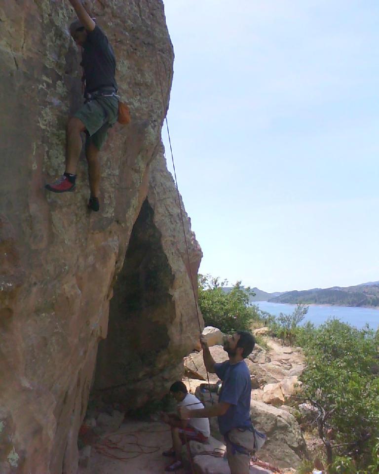 Raphael belaying Mehdi on the 5.10 at Rotary Park, with Jaime down below.