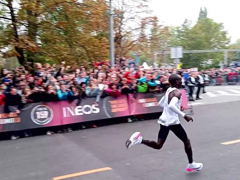 Eliud Kipchoge sprinting in the final 50 meters of the INEOS 1:59 Challenge.