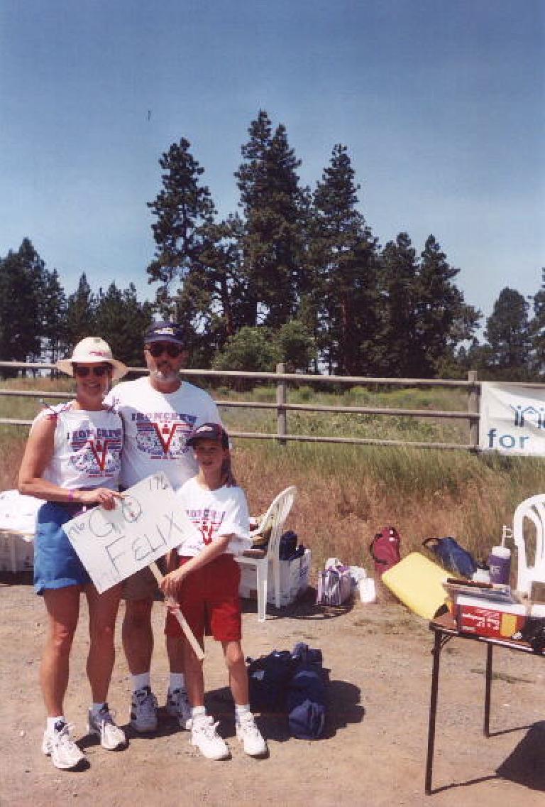 During the bike leg, Deborah, the most kind-hearted volunteer I have ever met in my life, came out to not only to hand off water bottles but to root for me!  Here she is with her family, including husband Bob and son Taylor.