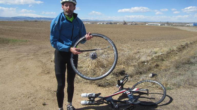 With only about five miles to go, I encountered a cyclist named Scott who got a flat tire. I lent him some tire irons.