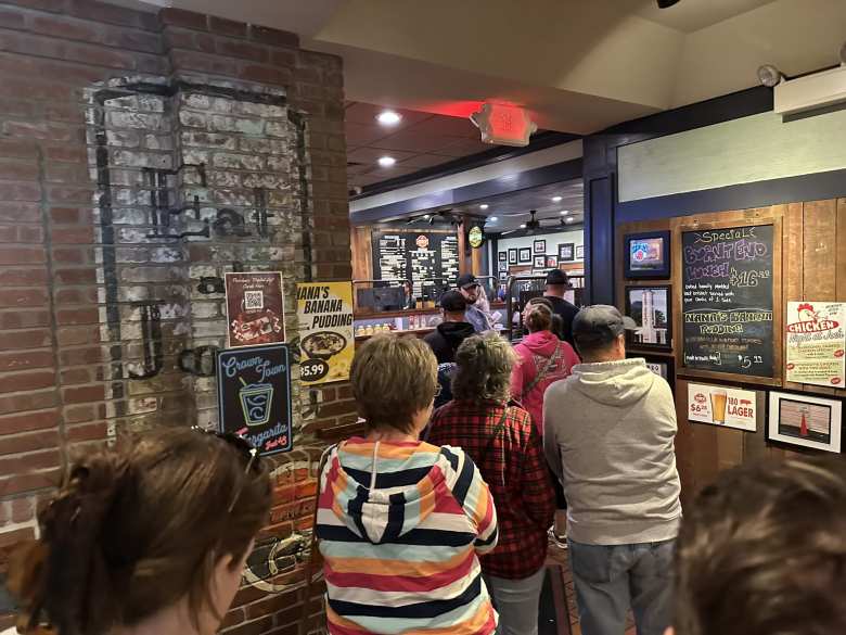 The line at Joe's Kansas City Bar-B-Que started out the door and snaked around inside. But it moved quickly.