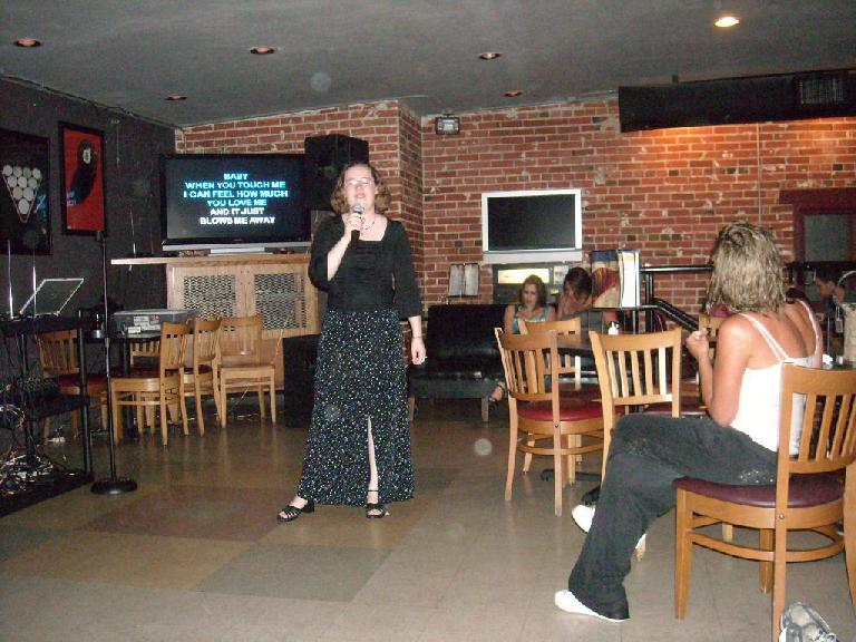 Bev singing a second song of three.
