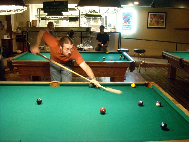 Jesse taking a pool shot at Coopersmith's.