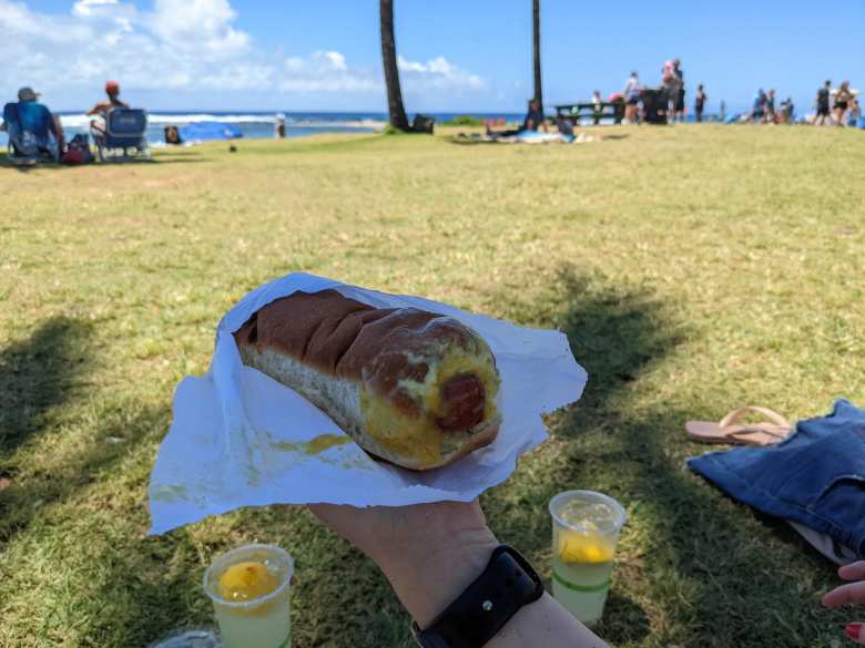 Andrea and I ate a Puka Dog at Poipu Beach Park after the Kauai Marathon.