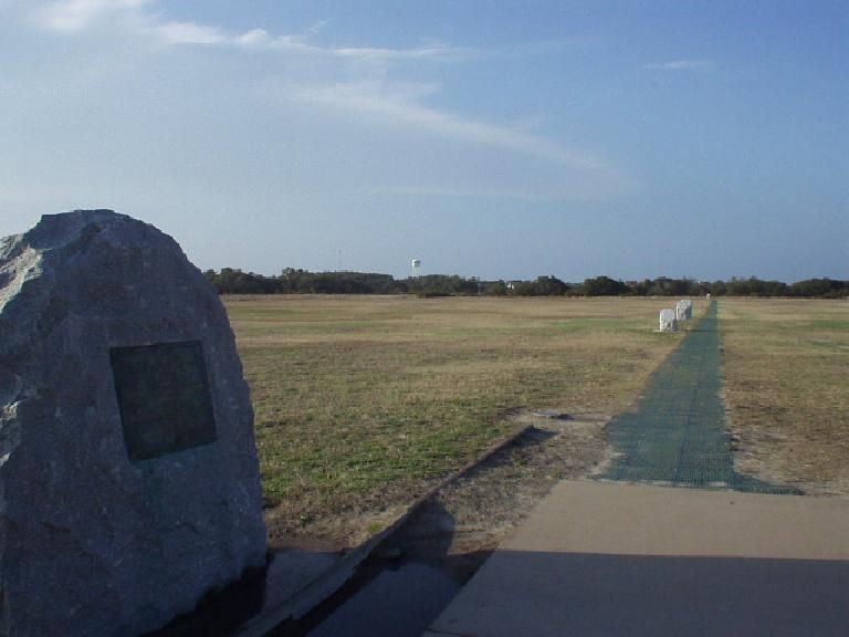 Down below and to the north of the monument are boulders demarking the beginning point of their first flights.  The boulders in the distance demark where they landed after successful Flight #1, 2, 3, and 4.