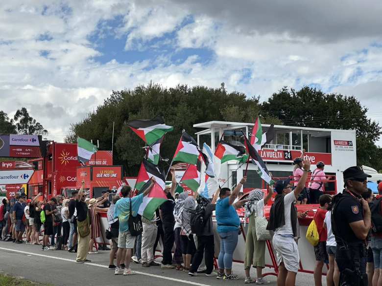 There were many spectators waving Palestinian flags.