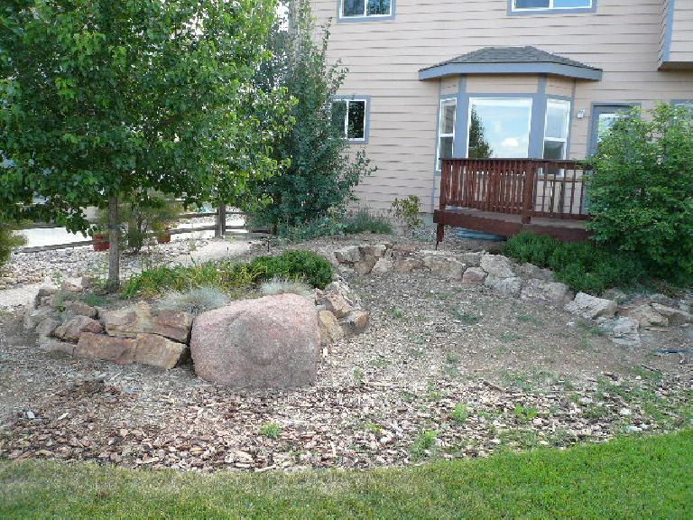 [Before] Landscaping in front of the deck.