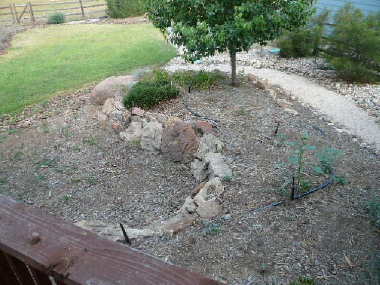 [Before] Landscaping to the right of the deck.