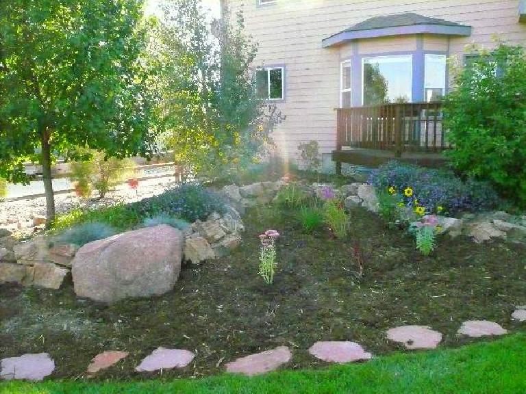 [After] Landscaping in front of the deck.