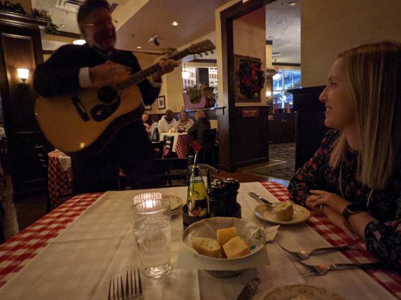 Ty Lemly playing Happy Birthday on the guitar to Andrea at Maggiano's Italian Restaurant.
