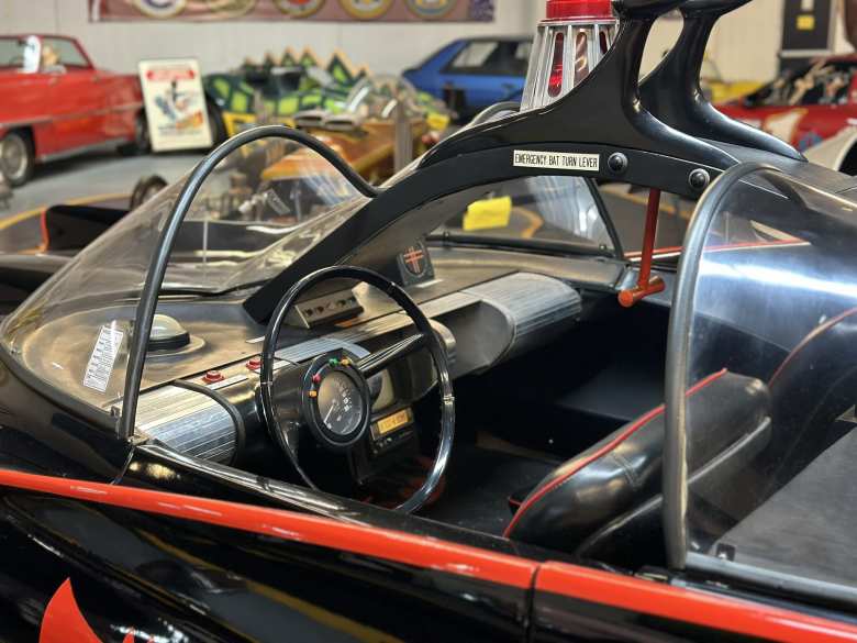 Inside the 1960s Batmobile with emergency Bat Turn Lever.
