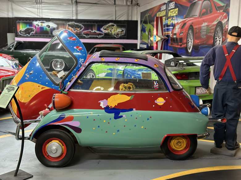 1958 BMW Isetta with a Peter Max-type art theme.