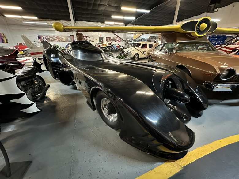 This is the Batmobile from Batman Returns. To the right is the AMC Matador aircar from The Man With a Golden Gun 007 movie.