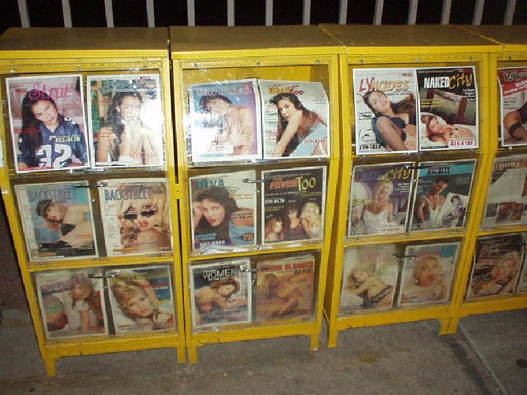 Girly mags, posters and "baseball cards" are ubiquitous all over the strip.