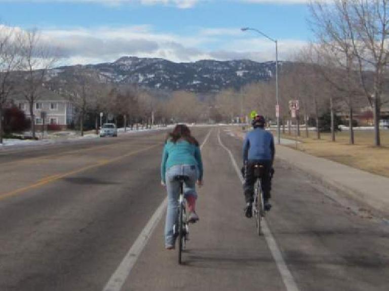 Kelly and Dave riding towards Horsetooth Rock. Kelly and Dave riding towards Horsetooth Rock.