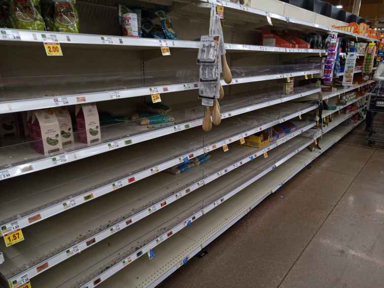 A day after the country's State of Emergency declaration for the coronavirus, shelves for staples like canned vegetables and beans at King Soopers were empty.