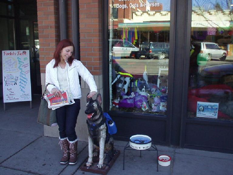 Lisa makes friends with a dog after we had lunch in Boulder.