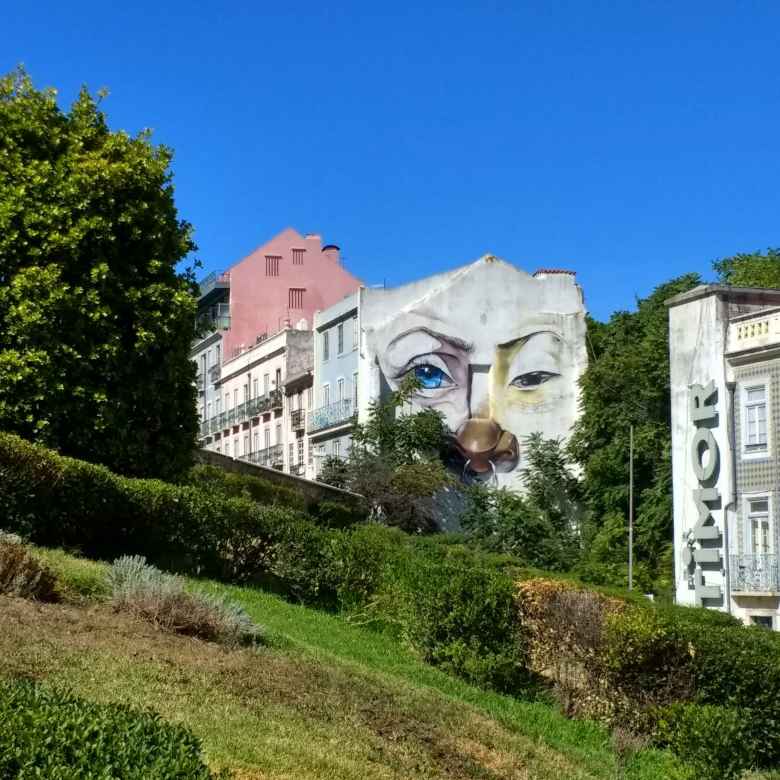 Mural of watchful eyes next to the Palácio de SÃ£o Bento.