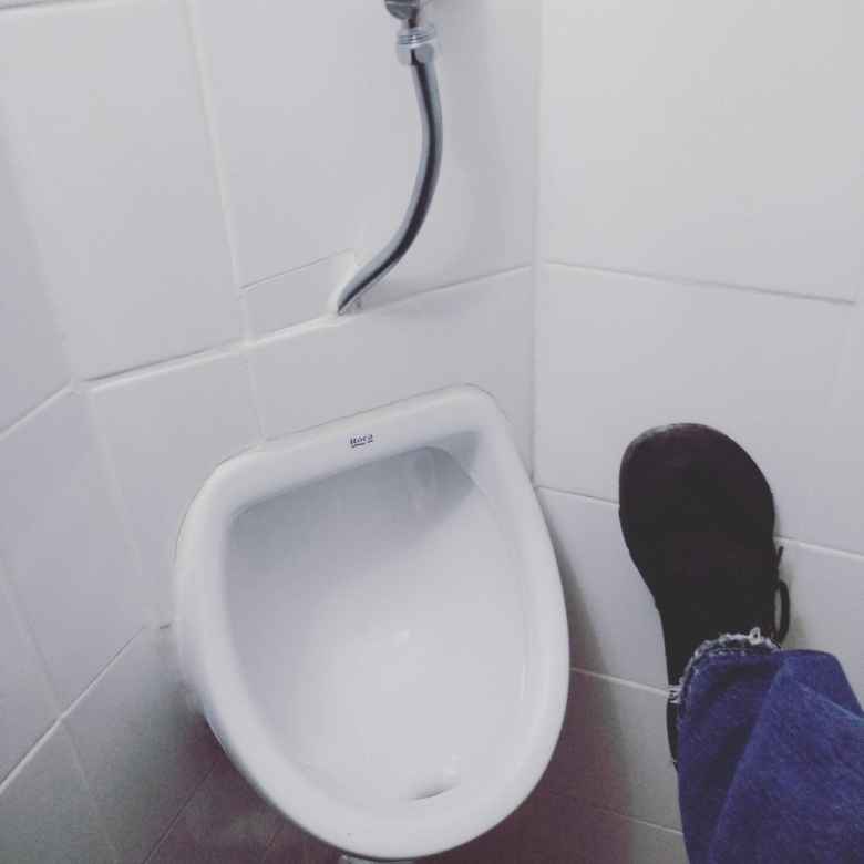 At a restaurant in Lisbon, Portugal was the smallest urinal I have ever seen.