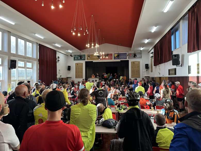 London-Edinburgh-London staff announcing at the Malton control that the event has been cancelled (actually, shortened) and everyone should start riding the following day back towards London. London-Edinburgh-London staff announcing at the Malton control that the event has been cancelled (actually, shortened) and everyone should start riding the following day back towards London.