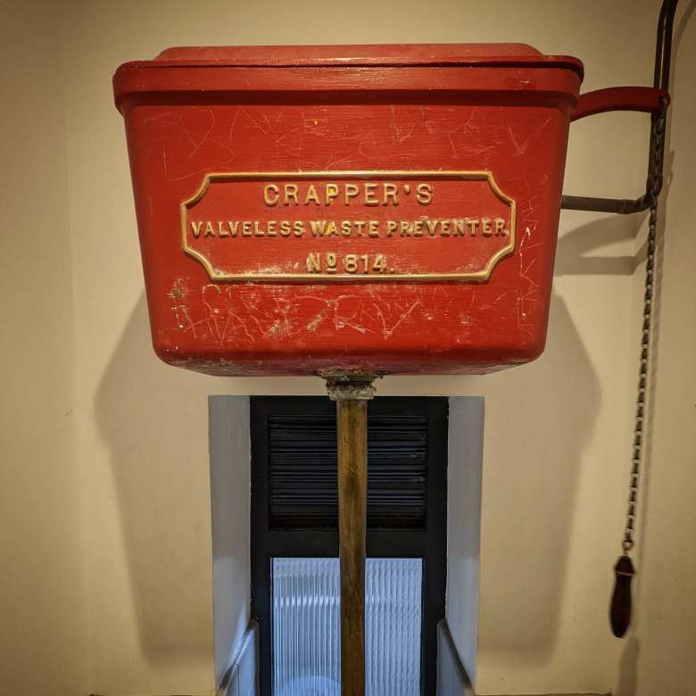 A red Crapper's toilet.