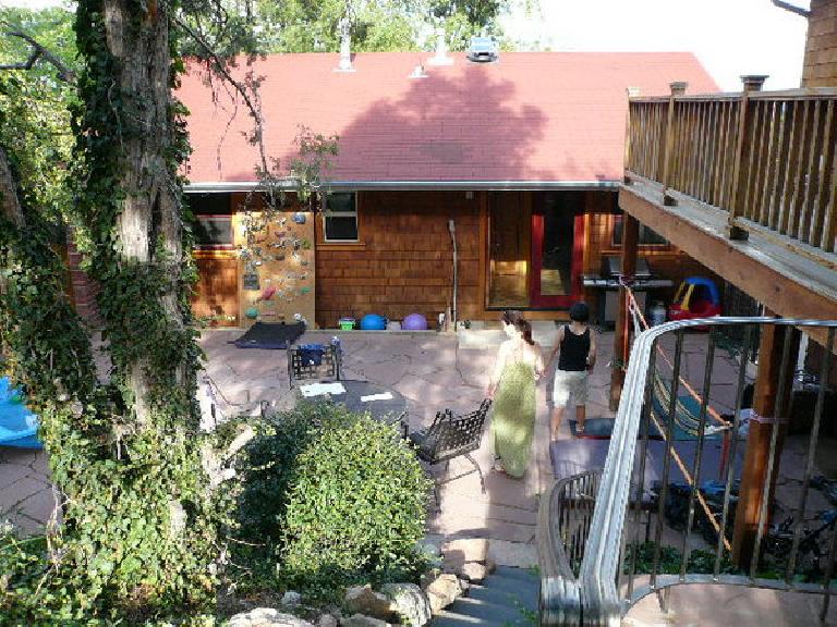 Lynn's back yard includes a bouldering wall for her four-year-old.